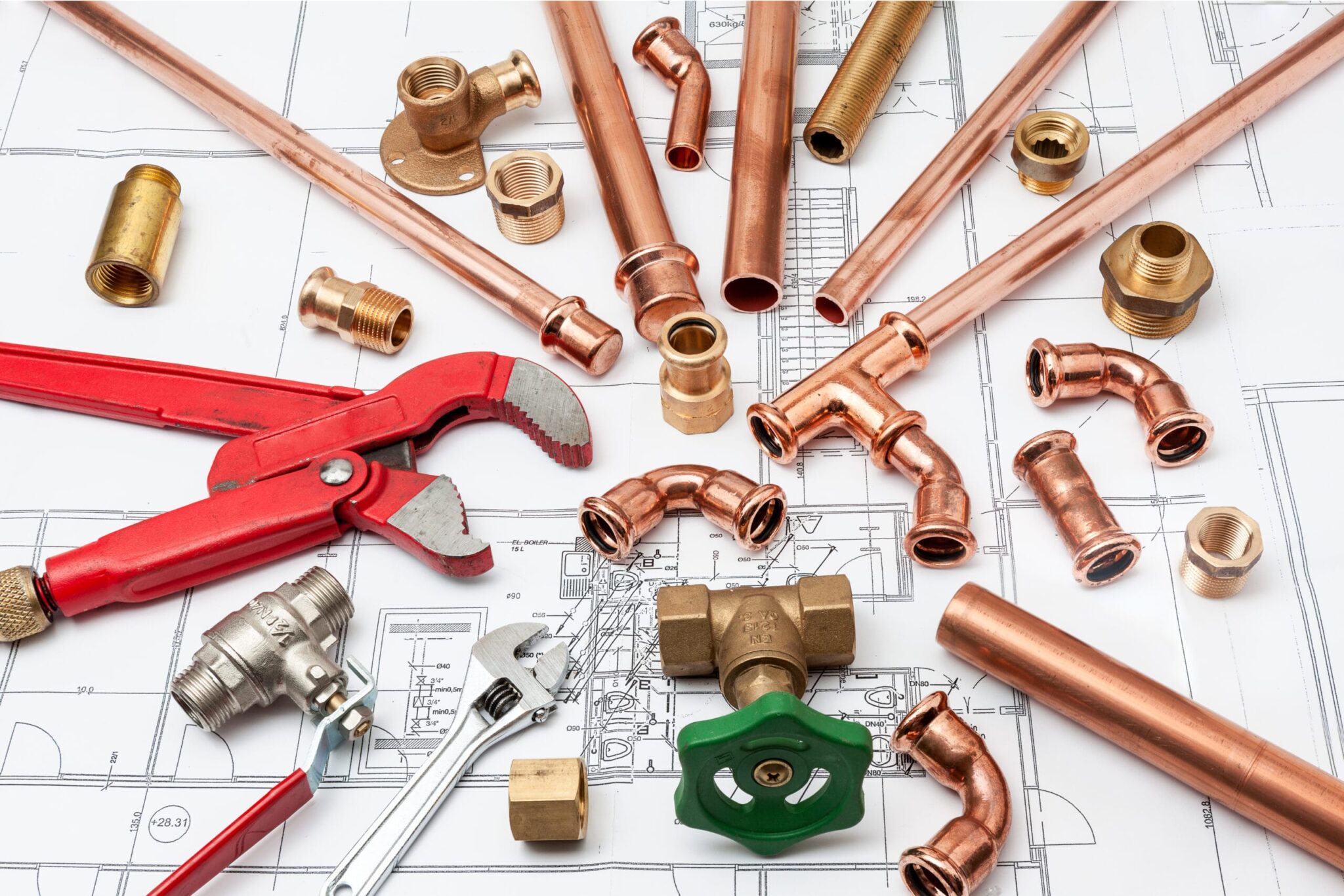Copper pipes, fittings, valves, and plumbing tools in Duluth